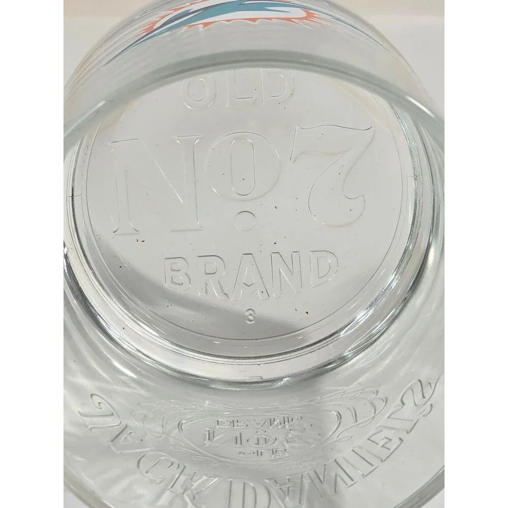Jack Daniel's promotional NFL rocks glasses featuring the Miami Dolphins logo
